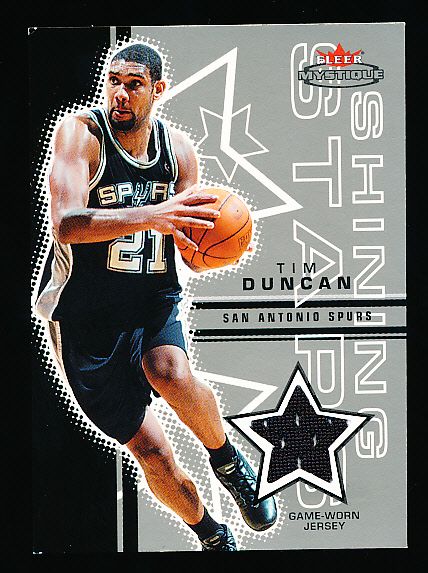 2003-04 Fleer Mystique Bskbl. “Shining Stars Jersey” #TD Tim Duncan, Spurs