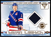 2002 Private Stock Titanium Hockey- “Dual Game-Worn Jerseys”- #26 Brian Leetch/ Rico Fata, Rangers